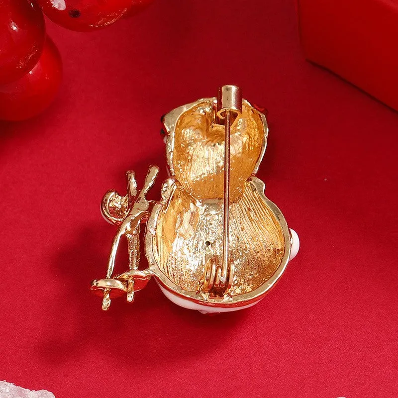 Cubic Zirconia & 18K Gold-Plated Skiing Snowman Brooch