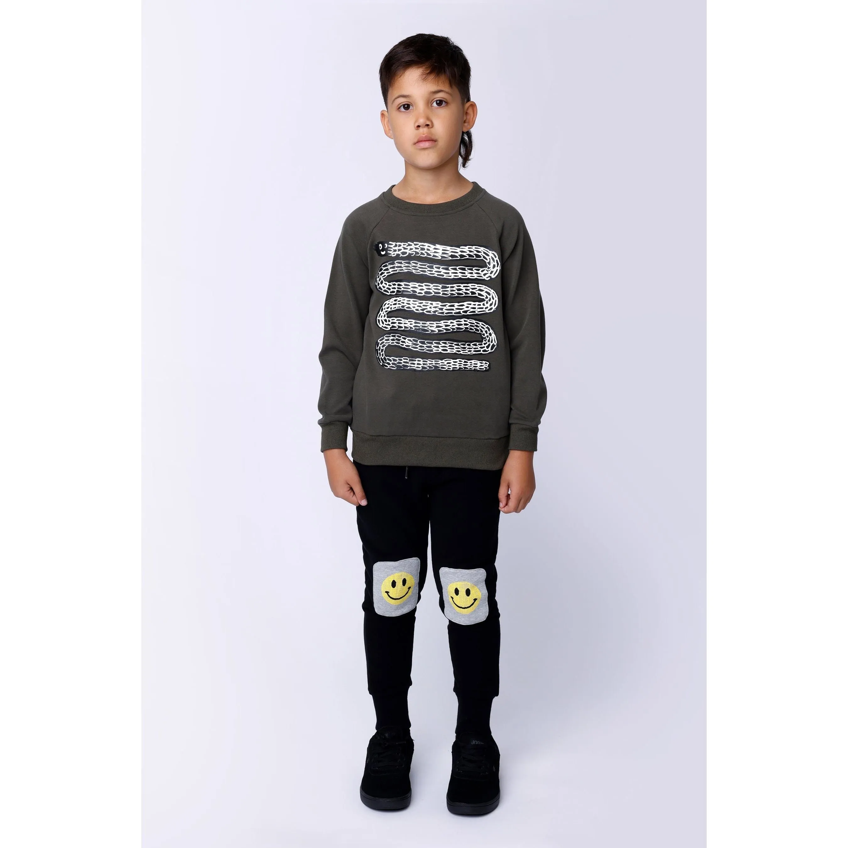Pixelled Face Furry Trackies